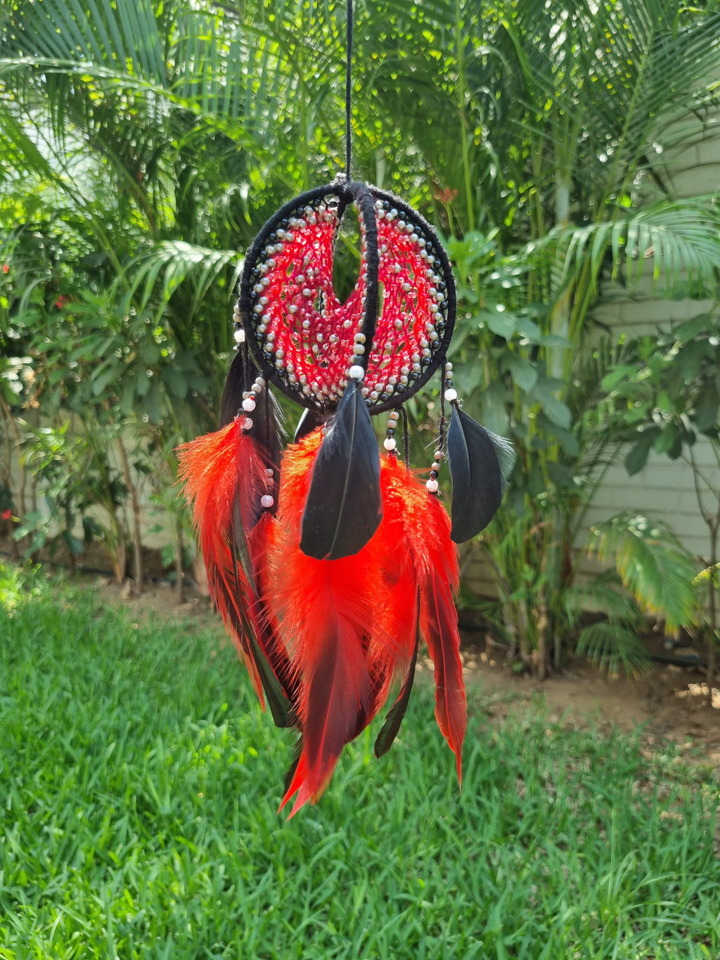 Red Circular Car Hung