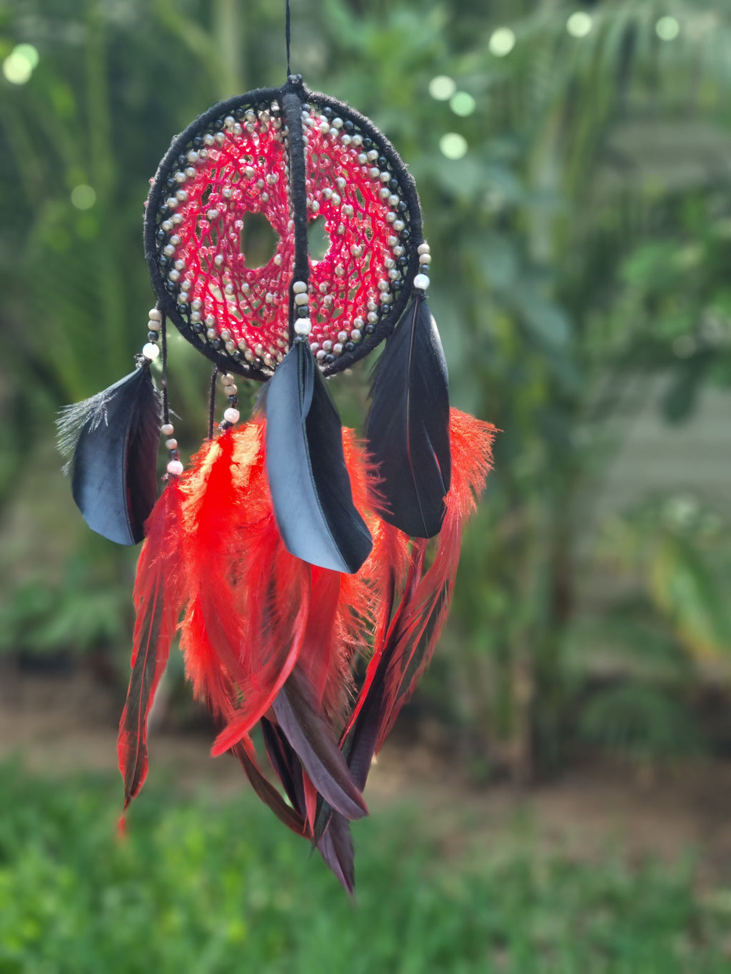 Red Circular Car Hung