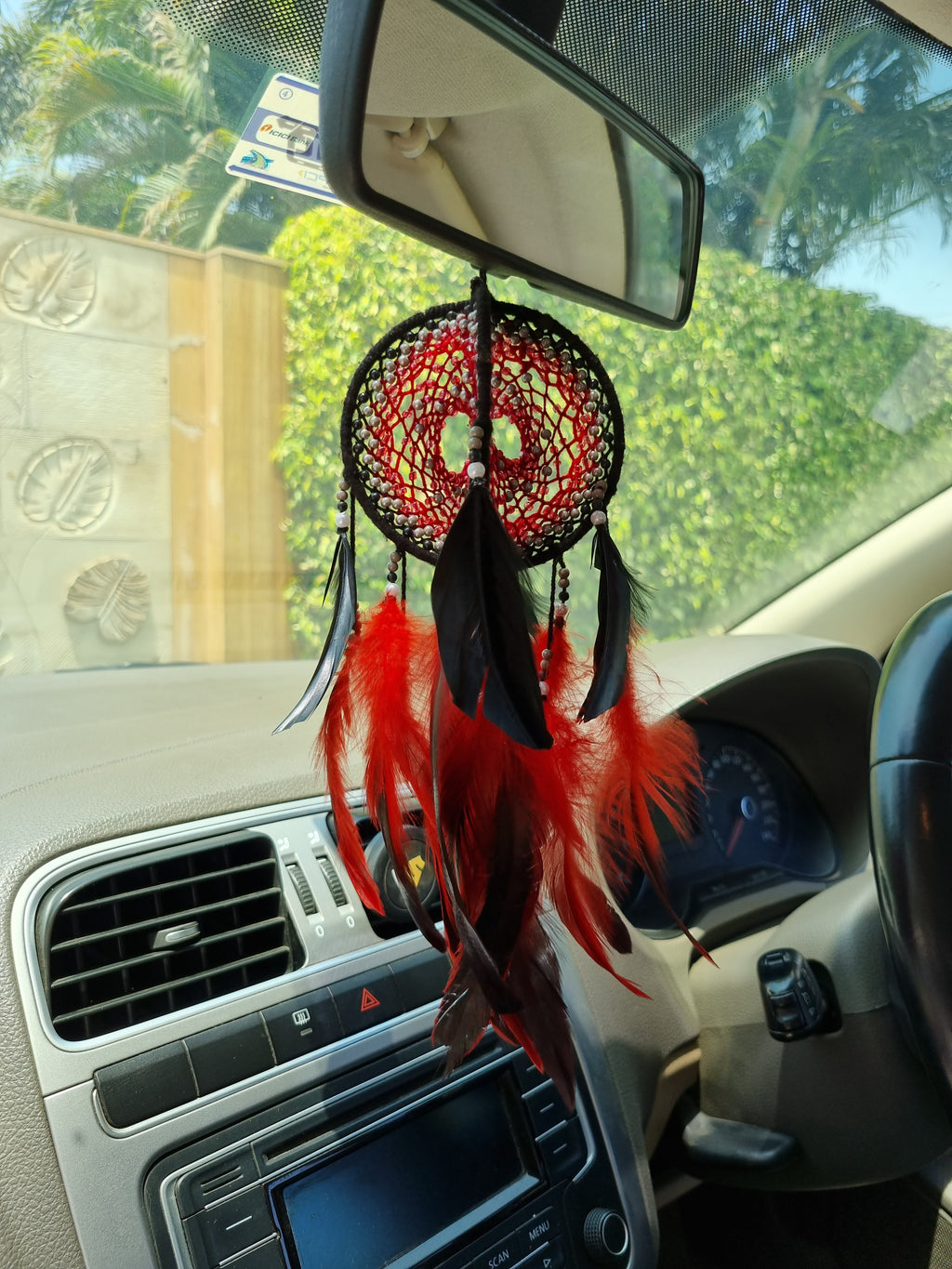 Red Circular Car Hung