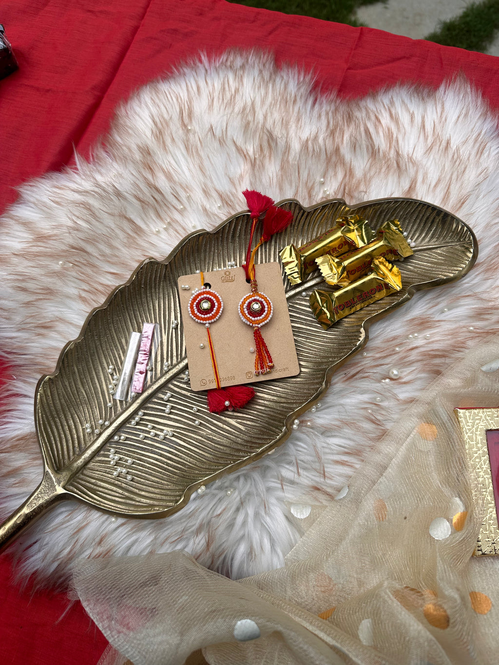 Traditional red beads Rakhi