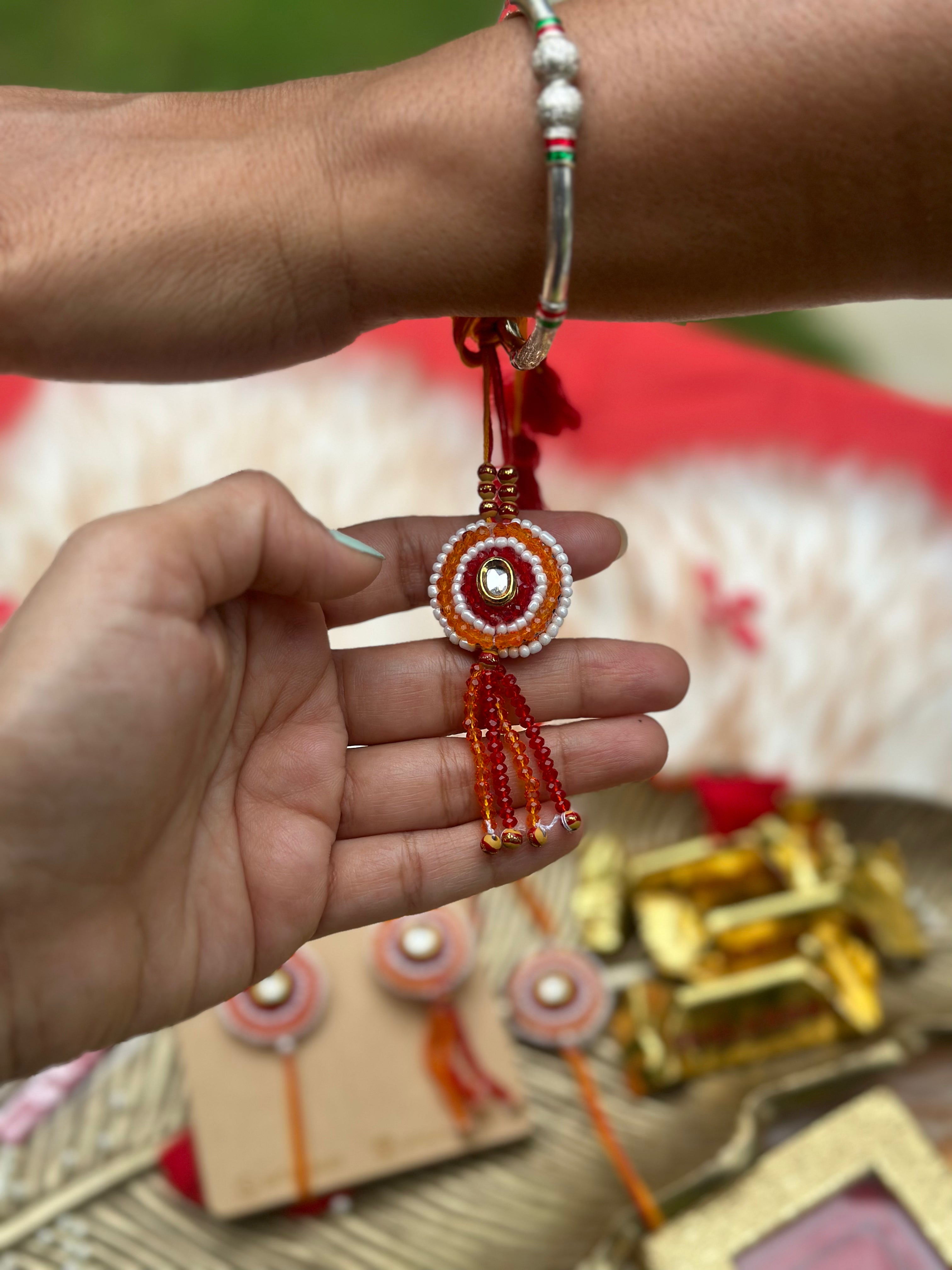 Traditional red beads Rakhi