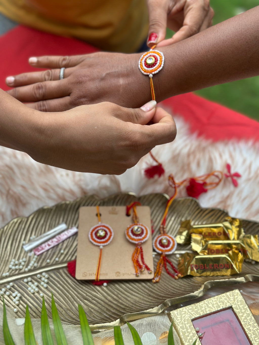 Traditional red beads Rakhi