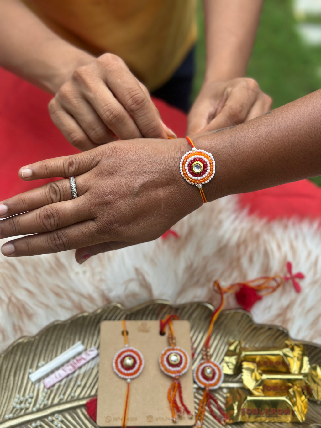 Traditional red beads Rakhi