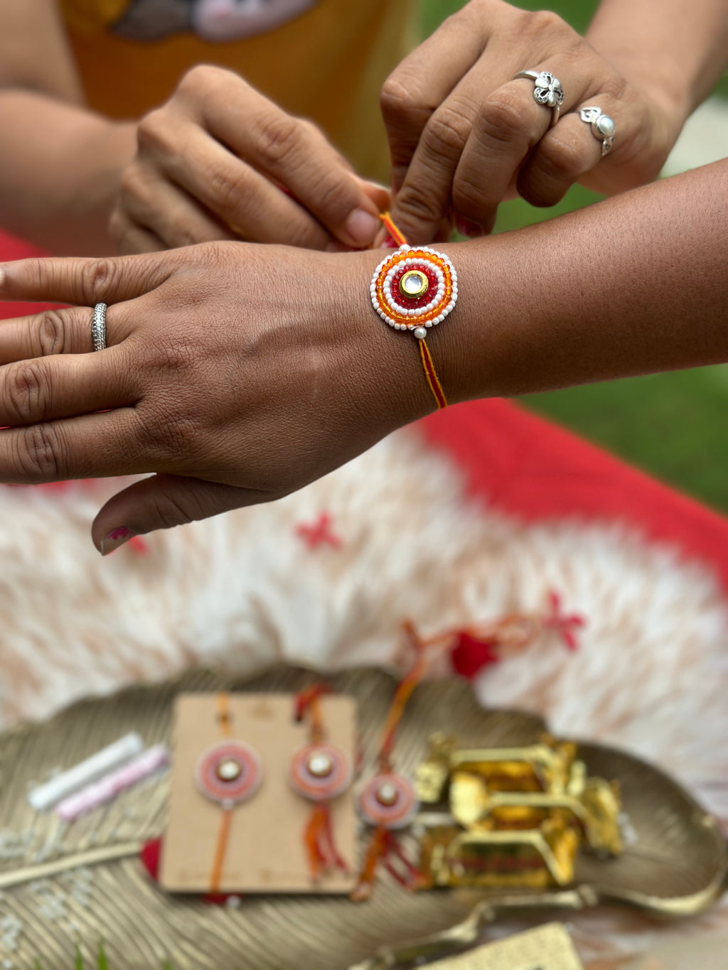 Traditional red beads Rakhi
